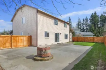 Huge patio with firepit.
