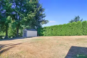 A relatively new garden shed stands on the northeast corner of the front yard.