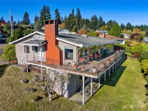 The large deck in the back is a prime viewing spot for the view and allows for great entertainment space for many guests.