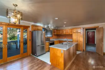 The kitchen with great room is located centrally between the two wings.