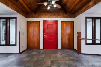 Entrance with vaulted ceiling.