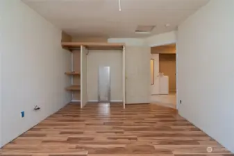 Bedroom #1, South Wing with laundry & 1/2 bath across hallway.