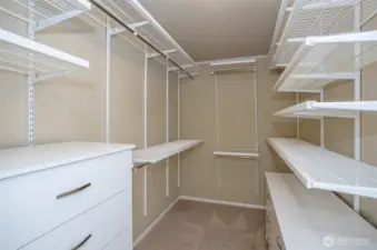 Well-appointed walk-in closet within the primary retreat.