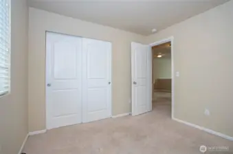 Third guest suite offers plenty of space to comfortably accommodate your visitors.