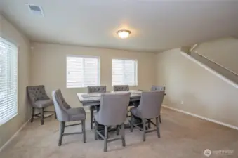 This view captures the living space from the entryway, showcasing its open feel.