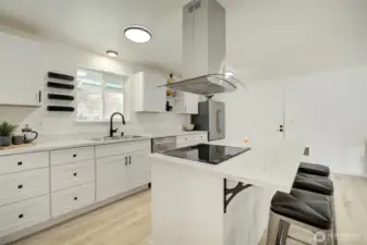 Plenty of counter and cabinet space here!