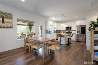 Open concept living and dining area.