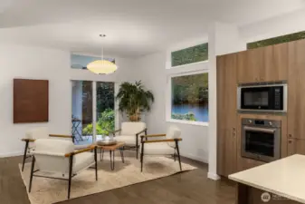 Breakfast nook off the kitchen connects to the private and covered patio.