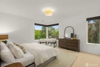Primary suite with new carpet, fresh paint, spa-inspired bathroom, and walk-in closet.