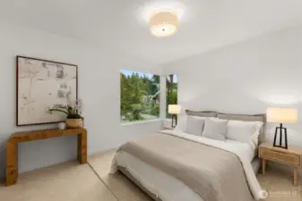 Spacious bedroom with new carpet and fresh paint.
