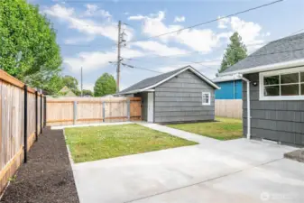 New fence, gates, patio and sidewalk