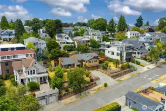 The street has evolved to a beautiful blend of high-end renovations of early 1900 homes and elegant newer construction.