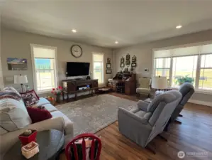 Comfortable sitting room with views to the south and west. Heated luxury vinyl plank floors throughout the home.