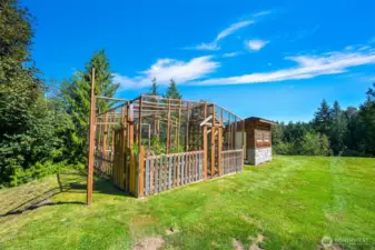 Fenced garden space, perfect for the avid gardener. Bunny hut