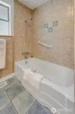 Bathtub on main level.