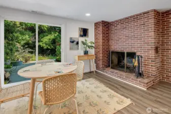 Wood fireplace in second living room.