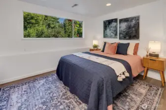 Bedroom on lower level with closet space.