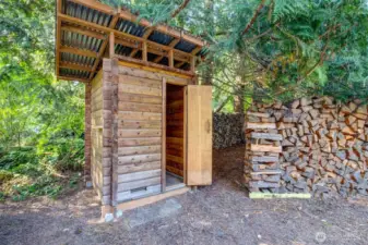 Secluded sauna at back of property.