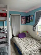 one of three bedrooms upstairs! Two closets are located in this bedroom