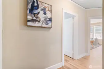 Open concept layout. Hallway leading to the bedroom.