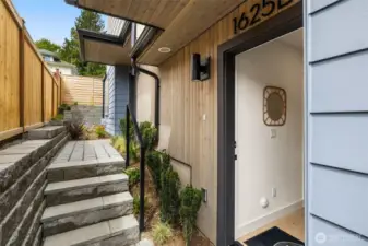 Private entry with riverside landscaping - Low maintenance!