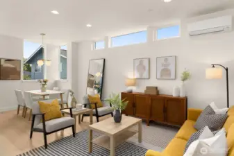The great room is wide & lives large, unlike the typical narrow townhome