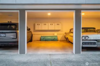 Covered space #2 with cabinetry storage  There is an additional uncovered parking space outside