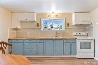 Butcher block countertops, tile backsplash