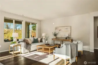 The light filled living area overlooks the private backyard.