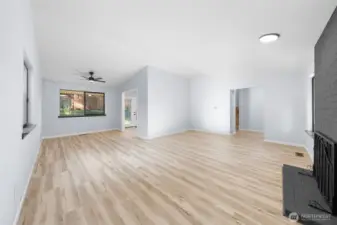 This is from the corner of the living room looking at the dining room and to the right is the front door entry.