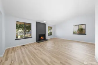 New Flooring, Fresh Pain in the whole room including the fireplace.