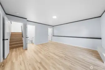 This is the daylight basement.  The door to the left leads you into the garage.