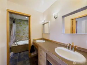 Primary bathroom ensuite. Soaking tub, shower, and dual sinks.