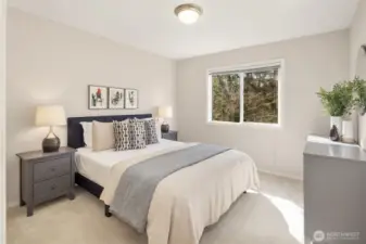 All 3 additional bedrooms are located on the upper floor with the primary suite.