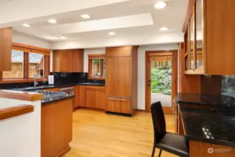 Spacious and brightly lit kitchen.