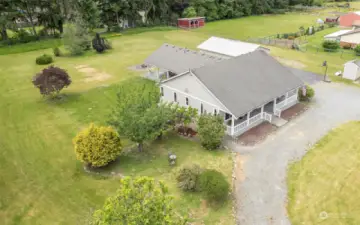 1.7 acres, level with detached garage. So much potential.