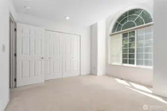 Upstairs bedroom with plenty of closet space and natural light.