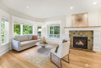 From the entry, the formal living space with gas fireplace is just to the left.