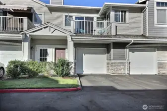 The spacious two bedroom condo has a Sunny Deck for morning coffees, and a single car garage with extra storage space.