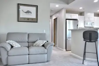 Enter ino the Open Space living room and dining area.