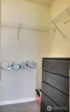 The Primary bedroom's walk-in closet stores everything.