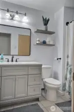 The full bath with tub and shower.