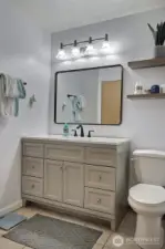 The bathroom vanity has been updated