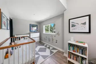 Second bedroom is currently being used as a baby's room.
