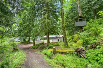 Walking down towards the house from the acres of private trails.