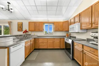 A new stainless dishwasher was installed after photo was taken