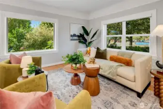 Spacious living gets plenty of light and overlooks the side and front yards.