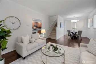 Living room flows seamlessly into the formal dining area or flexible living space