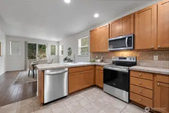 Spacious kitchen opening to the breakfast nook