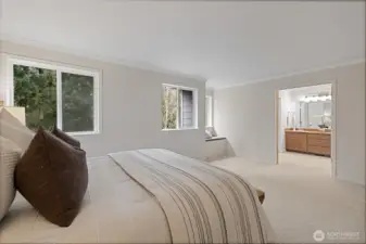 Double-door entry leading into the primary bathroom